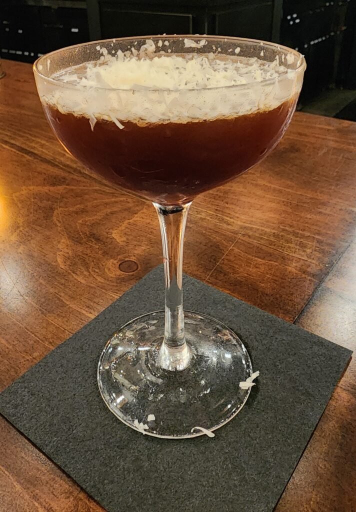 parmesan cheese espresso cocktail in a coup glass at knowlton house