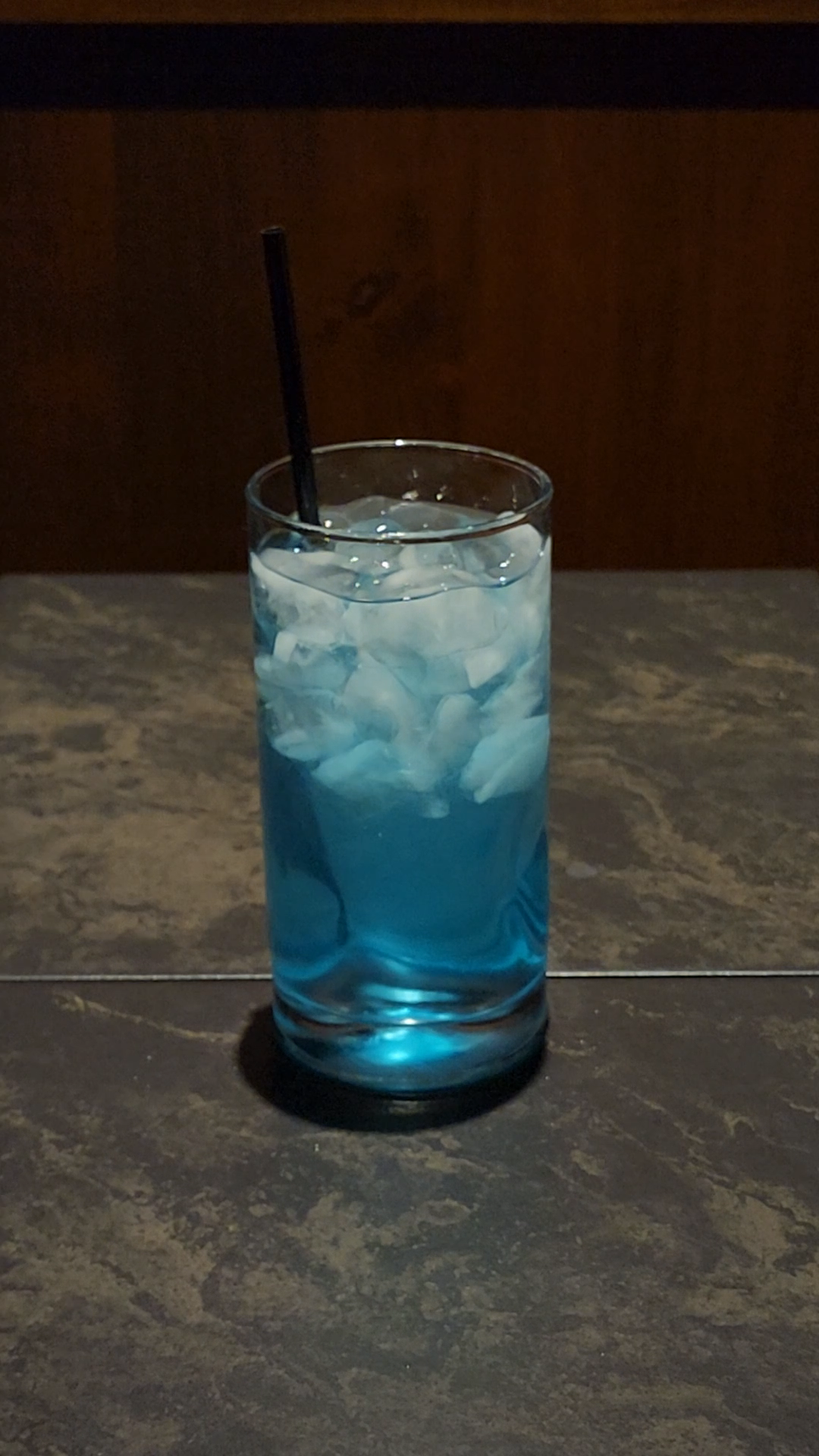 Blue Monday cocktail in a highball glass