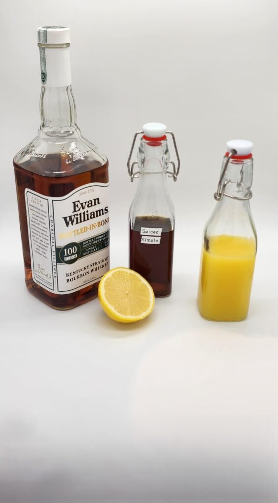 Bottle of bourbon bottle of citrus and spiced honey